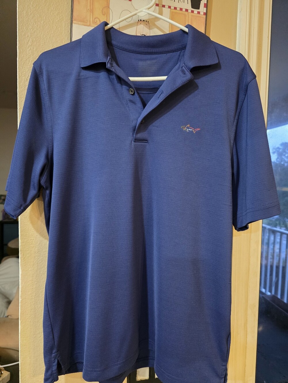 Greg Norman Collection Royal Blue Polo with Shark Emblem